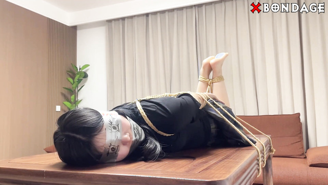 Chinesse Bondage - Tied to the table
