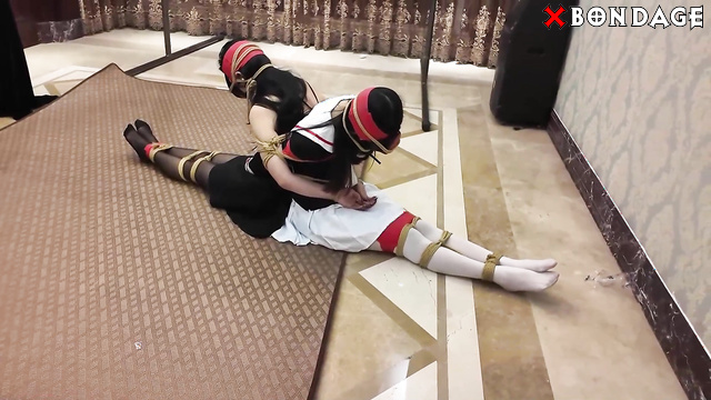 Chinese Bondage - Two cuties are tied together