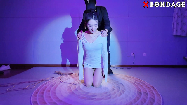Chinese Bondage - Girl in white boots