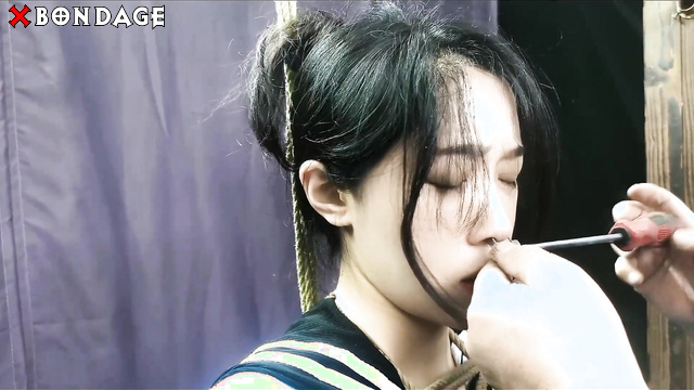 Chinesse Bondage - Lots of female saliva in a bowl