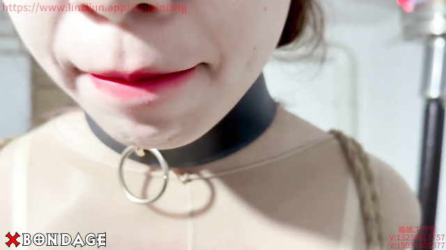 Chinese Bondage - Long-legged brunette in a cage