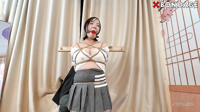 Chinese Bondage - Hot Asian Brunette Kneeling in Tight Shibari