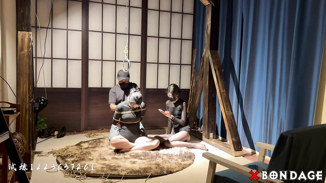 Chinese Bondage - Two Asian Slaves Tied Up Suspended and Caned
