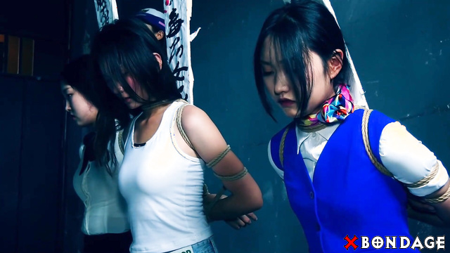 Chinese Bondage - Sexy Asian Brunettes Kneeling Chained in Prison