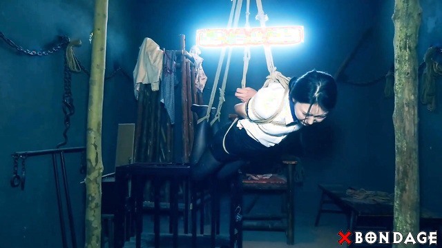 Chinese Bondage - Sexy Asian Prisoner Suspended in Ropes