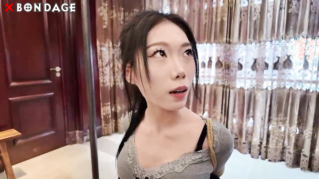Chinese Bondage - Two Sexy Asian Sluts Tightly Bound in Ropes