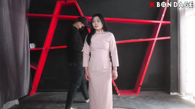 Chinese Bondage - A Beautiful Asian Girl Suspended in Shibari Bondage