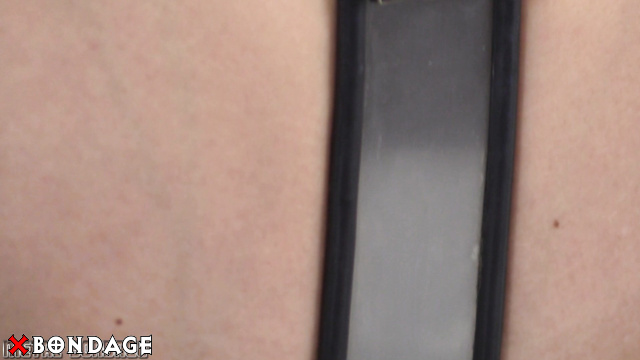 MetalBondage - Sexy Naked Brunette Shackled in a Showcase