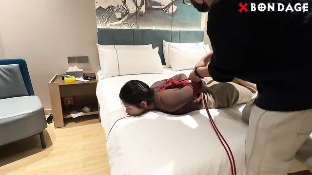 Chinese Bondage - Sexy Asian Girl Escapes from the Hogtie