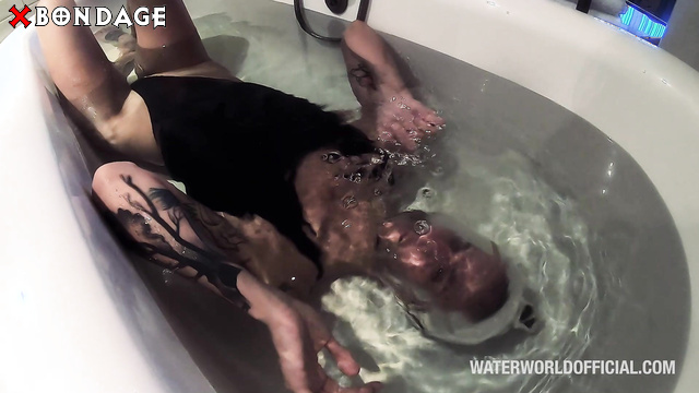 Water World - Skinny Brunette In Cuffs Underwater Breath Control