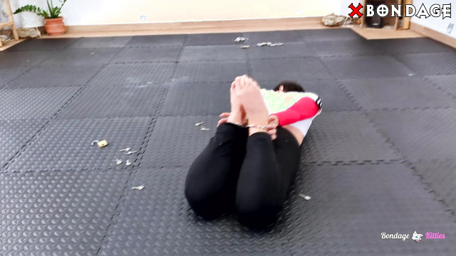 Bondage Kitties - Three Handcuffed and Hogtied Girls Attempt a Yoga Room Breakout