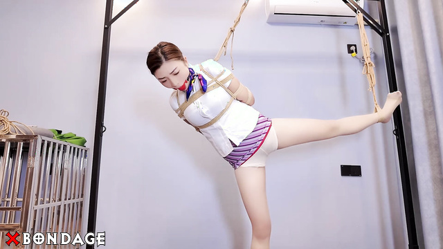 Jia Jia Bound in Reverse Hand Guanyin Pose Single-Leg Suspension