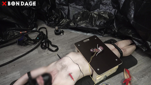 Mia in Charge - BDSM Domina Streched Out Helpless Slave And His Balls